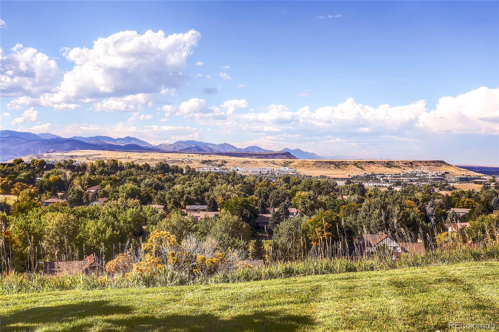 4880 Easley Road Golden, CO 80403 - Photo 32 of 40 a view of a city with mountains in the background