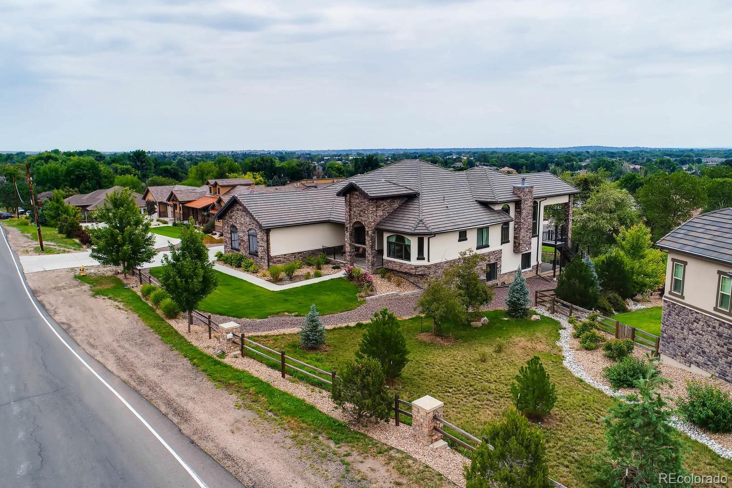 4880 Easley Road Golden, CO 80403 - Photo 4 of 40 an aerial view of a house with a garden