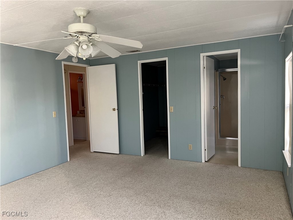 65 Sunset Circle North Fort Myers, FL 33903 - Photo 14 of 23 a view of a chandelier in a room