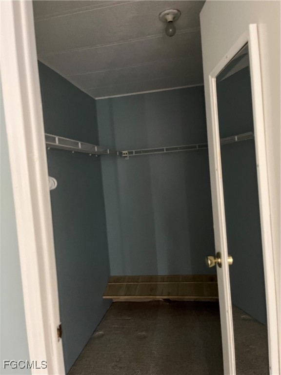 65 Sunset Circle North Fort Myers, FL 33903 - Photo 16 of 23 an empty room with a door