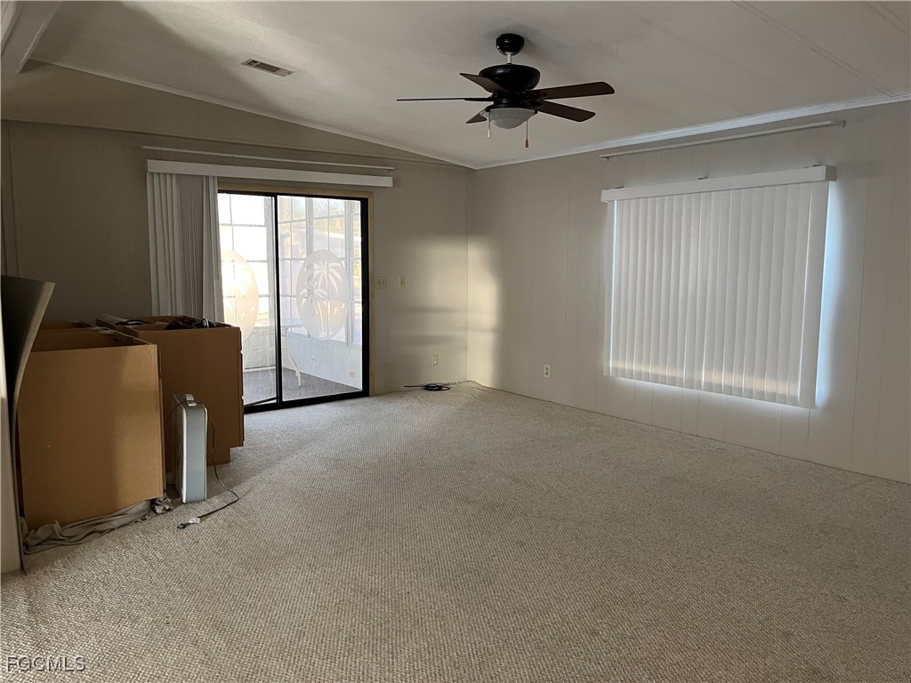 65 Sunset Circle North Fort Myers, FL 33903 - Photo 5 of 23 a view of an empty room with a window