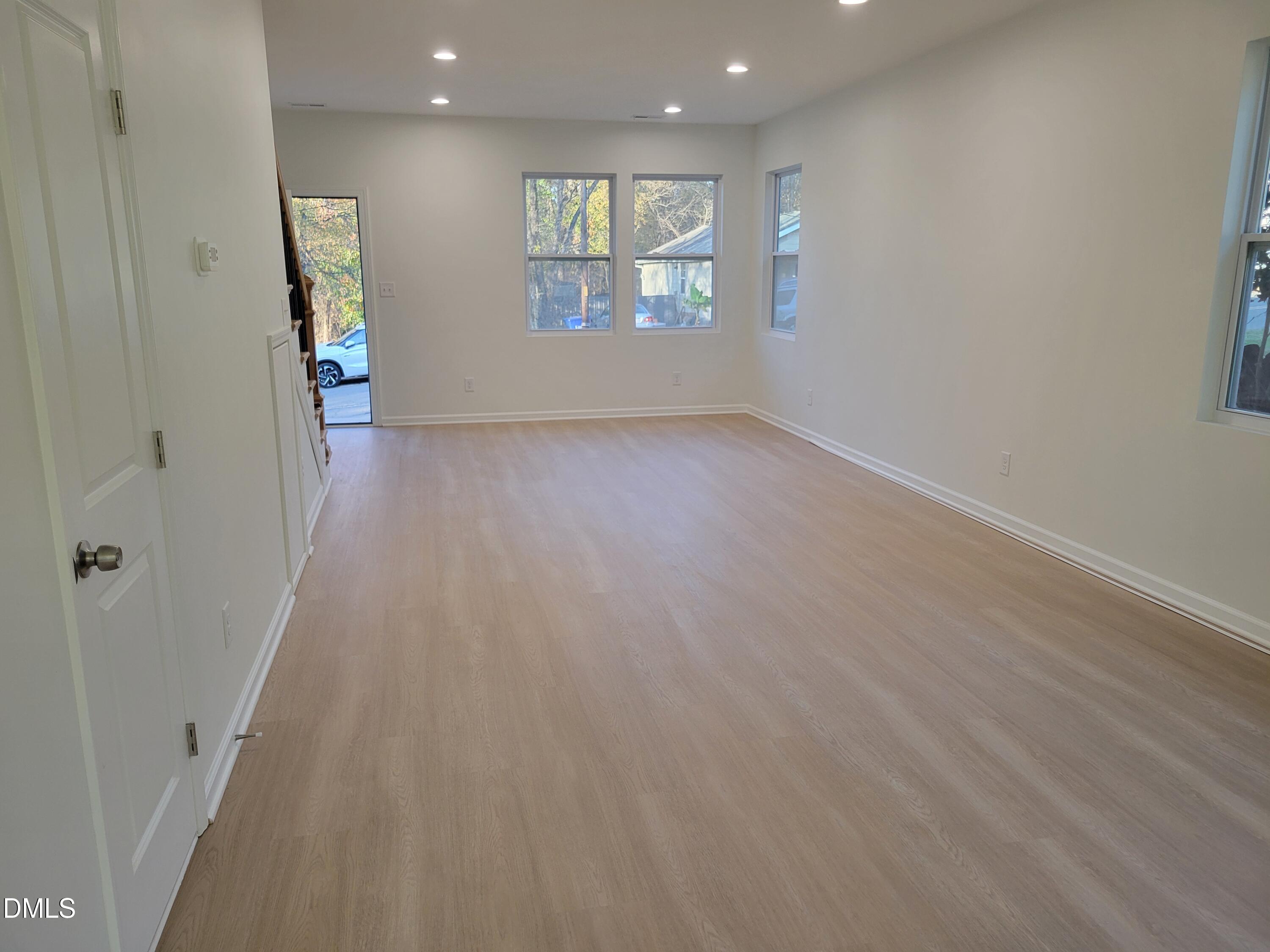 307 East End Avenue Durham, NC 27703 - Photo 16 of 22 an empty room with windows