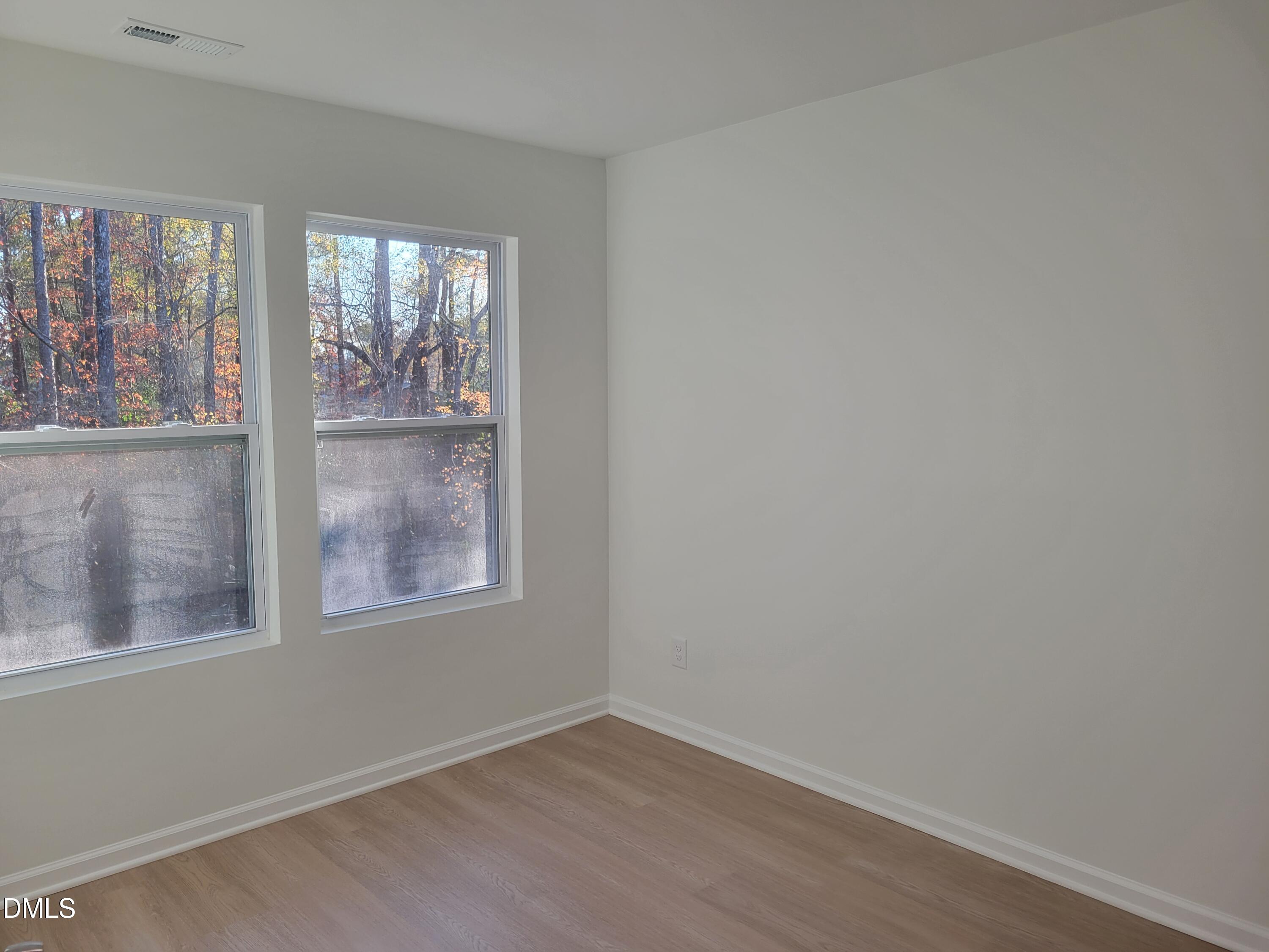 307 East End Avenue Durham, NC 27703 - Photo 20 of 22 an empty room with a window