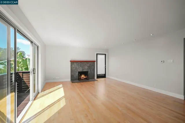 a kitchen with stainless steel appliances granite countertop a sink and a stove