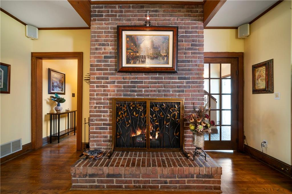 31 Coventry Drive Southeast Rome, GA 30161 - Photo 15 of 57 a front view of a house with entryway and wooden floor
