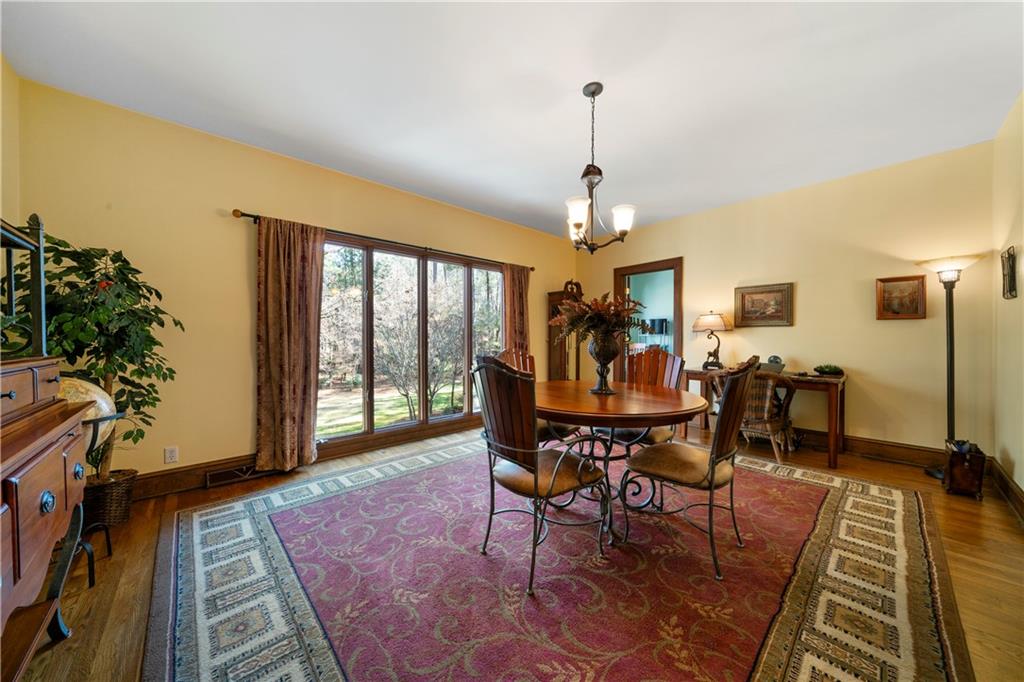 31 Coventry Drive Southeast Rome, GA 30161 - Photo 18 of 57 a view of a dining room with furniture window and wooden floor