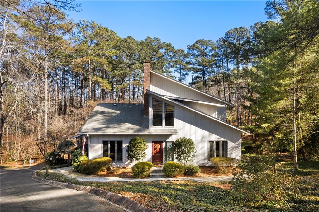 31 Coventry Drive Southeast Rome, GA 30161 - Photo 2 of 57 a front view of a house with a yard