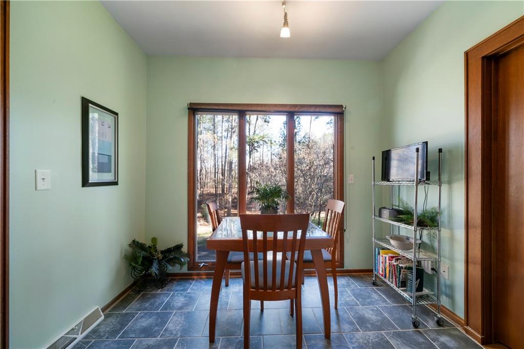 31 Coventry Drive Southeast Rome, GA 30161 - Photo 21 of 57 a view of a dining room with furniture window and outside view