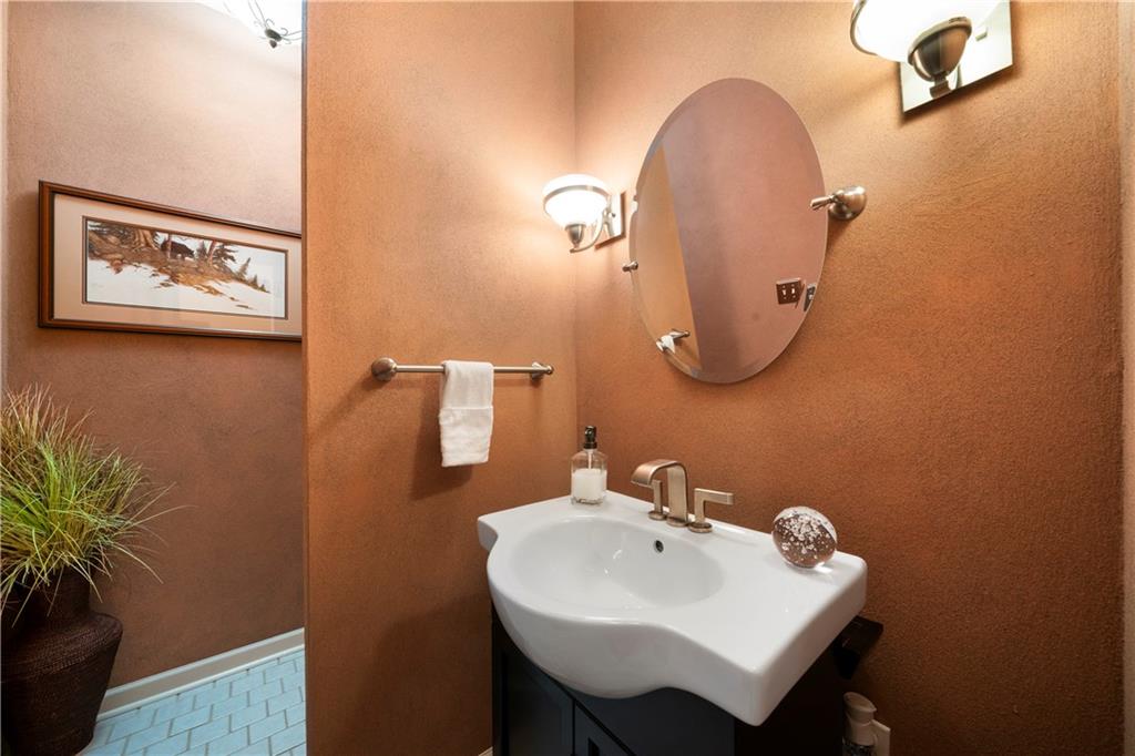31 Coventry Drive Southeast Rome, GA 30161 - Photo 26 of 57 a bathroom with a sink and a mirror