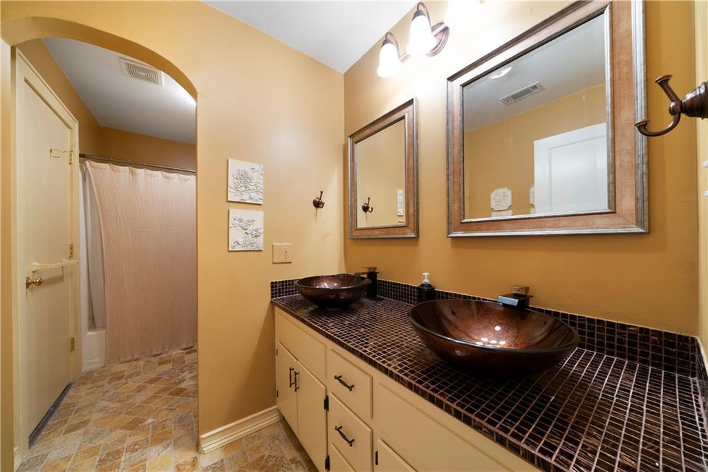 31 Coventry Drive Southeast Rome, GA 30161 - Photo 33 of 57 a bathroom with a granite countertop sink and a mirror