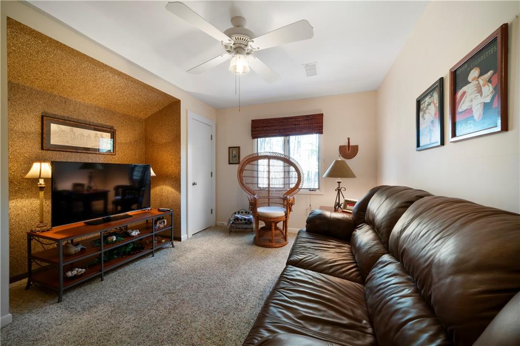 31 Coventry Drive Southeast Rome, GA 30161 - Photo 35 of 57 a living room with furniture and a flat screen tv