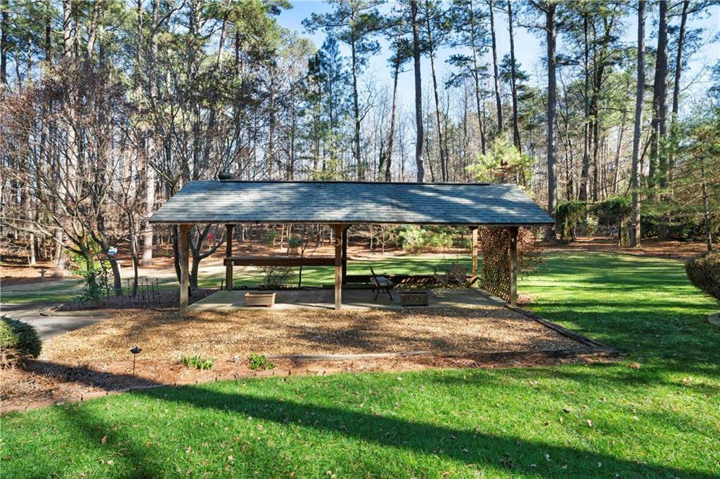 31 Coventry Drive Southeast Rome, GA 30161 - Photo 39 of 57 a view of a yard with an outdoor space