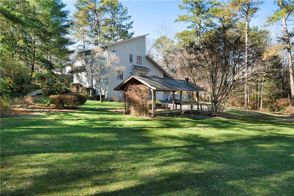 31 Coventry Drive Southeast Rome, GA 30161 - Photo 48 of 57 a front view of house with yard and green space