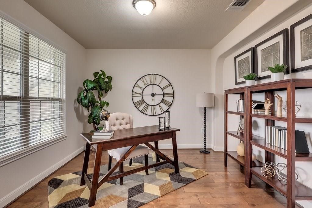 10825 Ballard Path Austin, TX 78717 - Photo 18 of 39 a view of a livingroom with furniture and a window