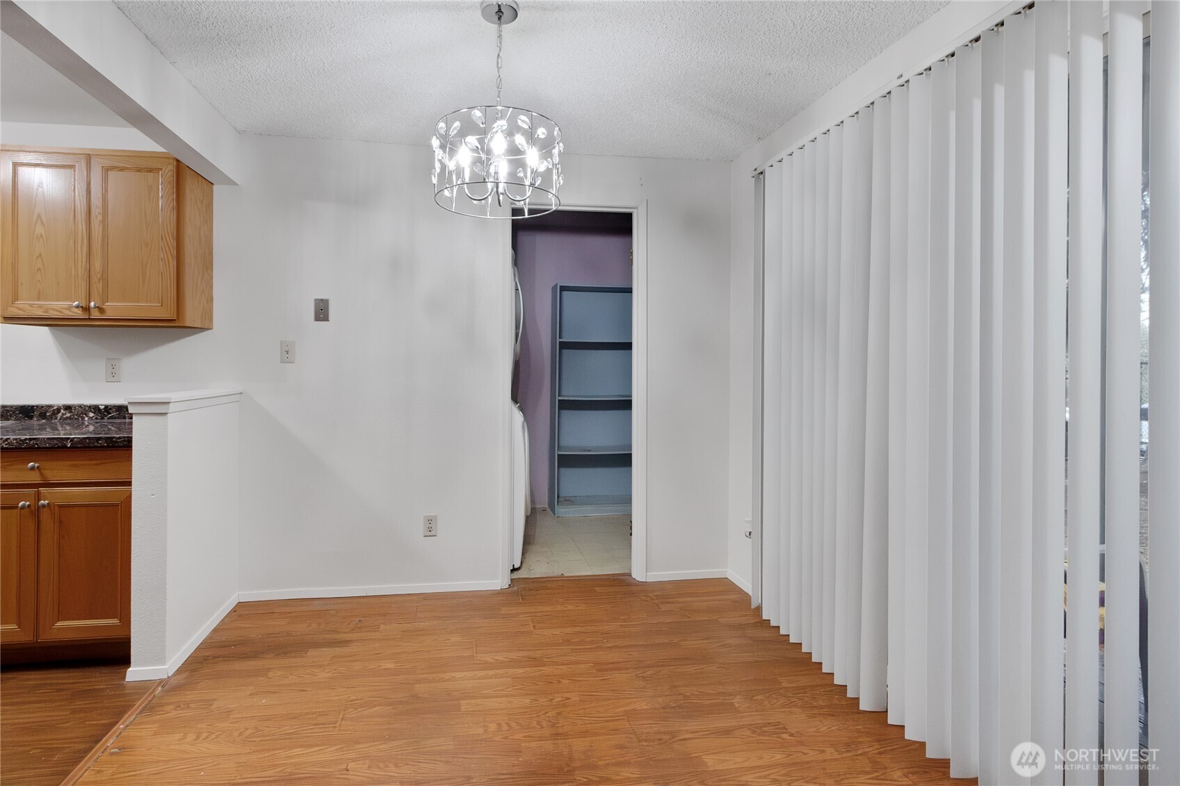 127 South 340th Street, Unit A Federal Way, WA 98003 - Photo 11 of 19 a view of an empty room with a kitchen