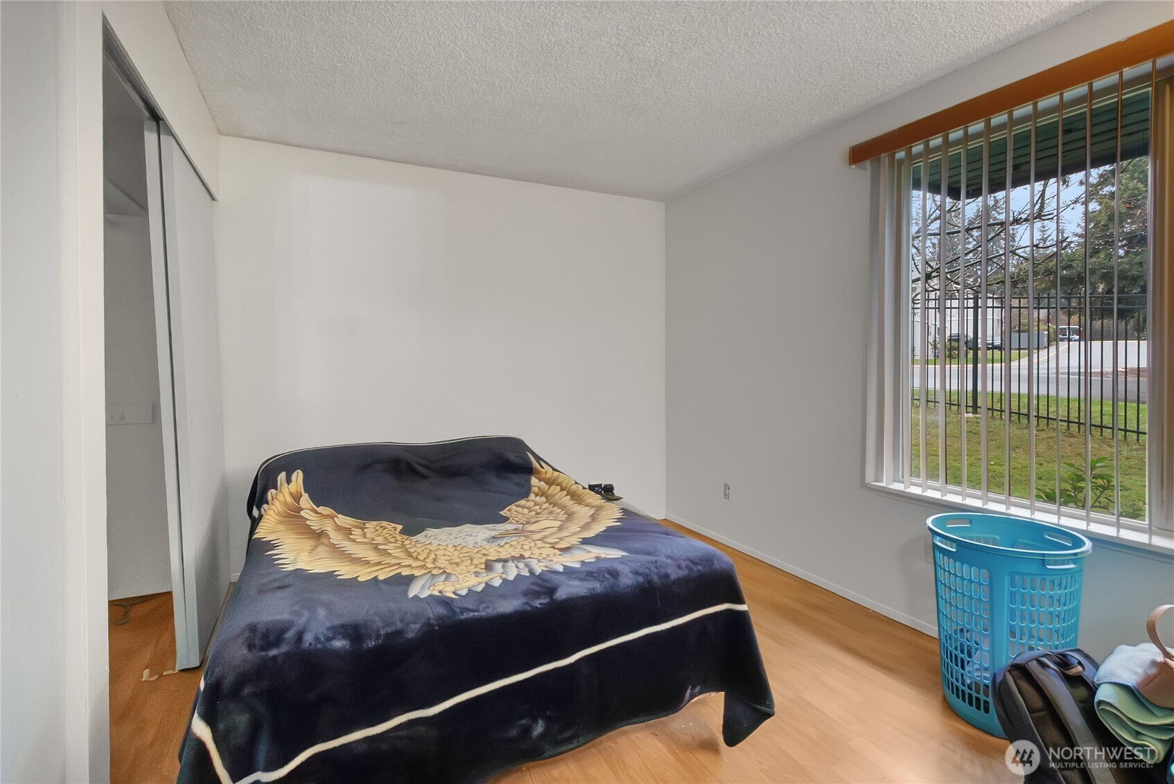 127 South 340th Street, Unit A Federal Way, WA 98003 - Photo 18 of 19 a room with a bed and a window