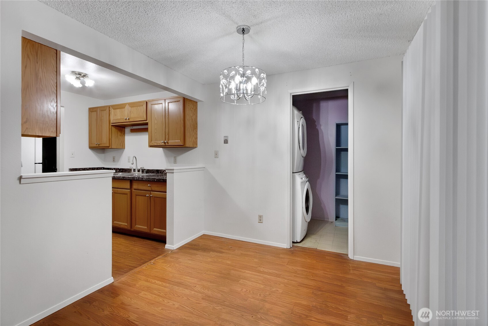 127 South 340th Street, Unit A Federal Way, WA 98003 - Photo 10 of 19 a view of kitchen with sink and refrigerator