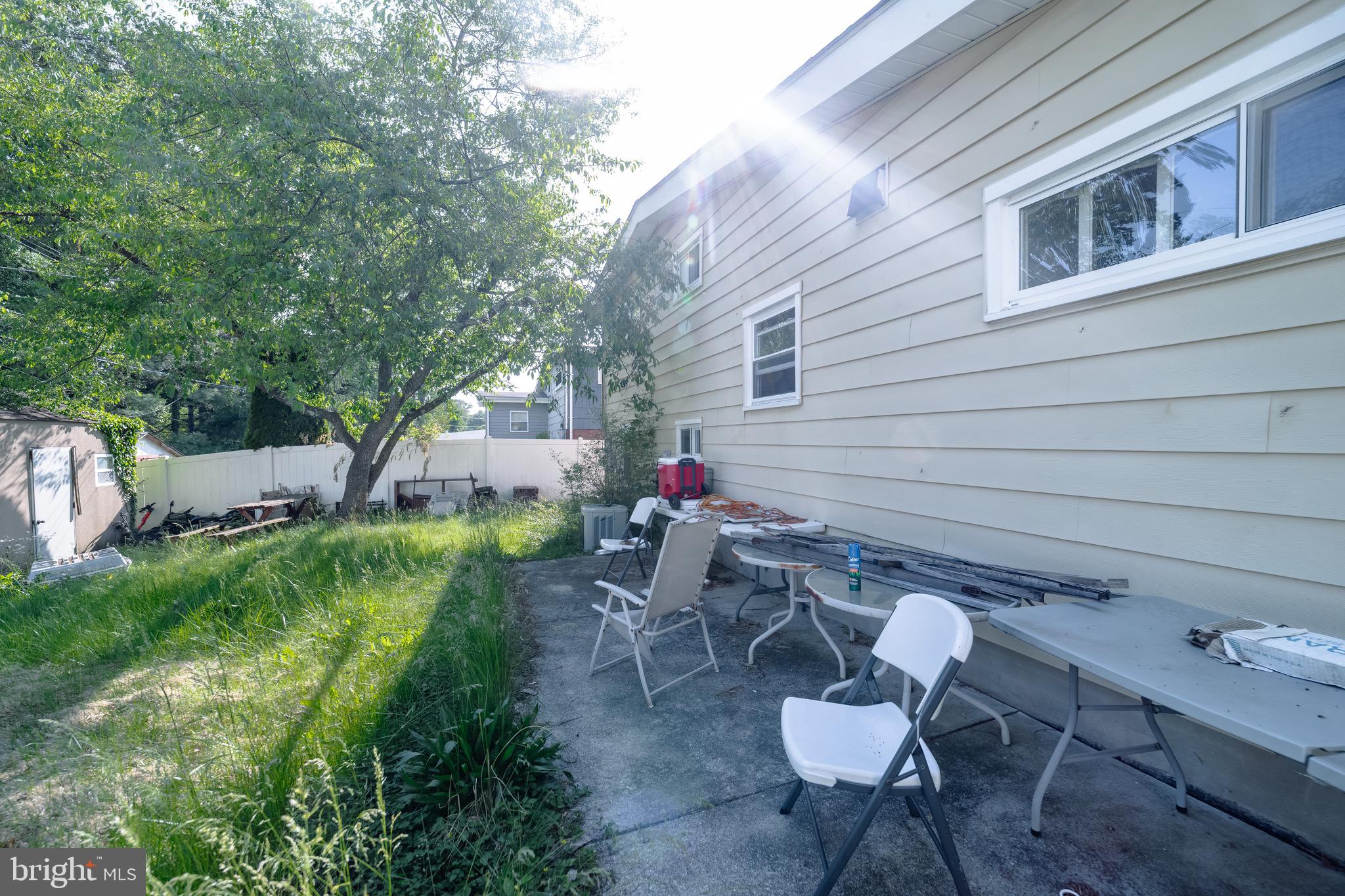 4125 Ronis Road Pikesville, MD 21208 - Photo 38 of 40 a view of a chairs and table in backyard