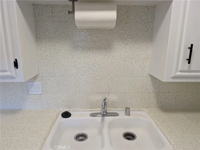 a view of front door with wooden floor