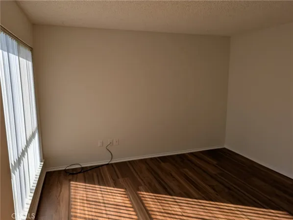 a bathroom with a shower toilet and sink