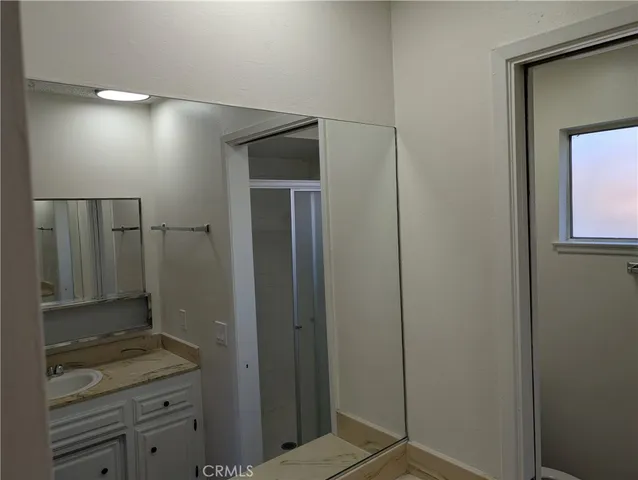 a view of a room that has a large window