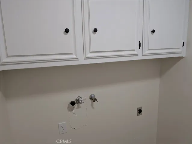 a big yard with lots of green space and plants