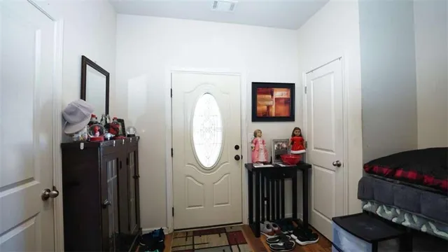 a view of a hallway with elevator