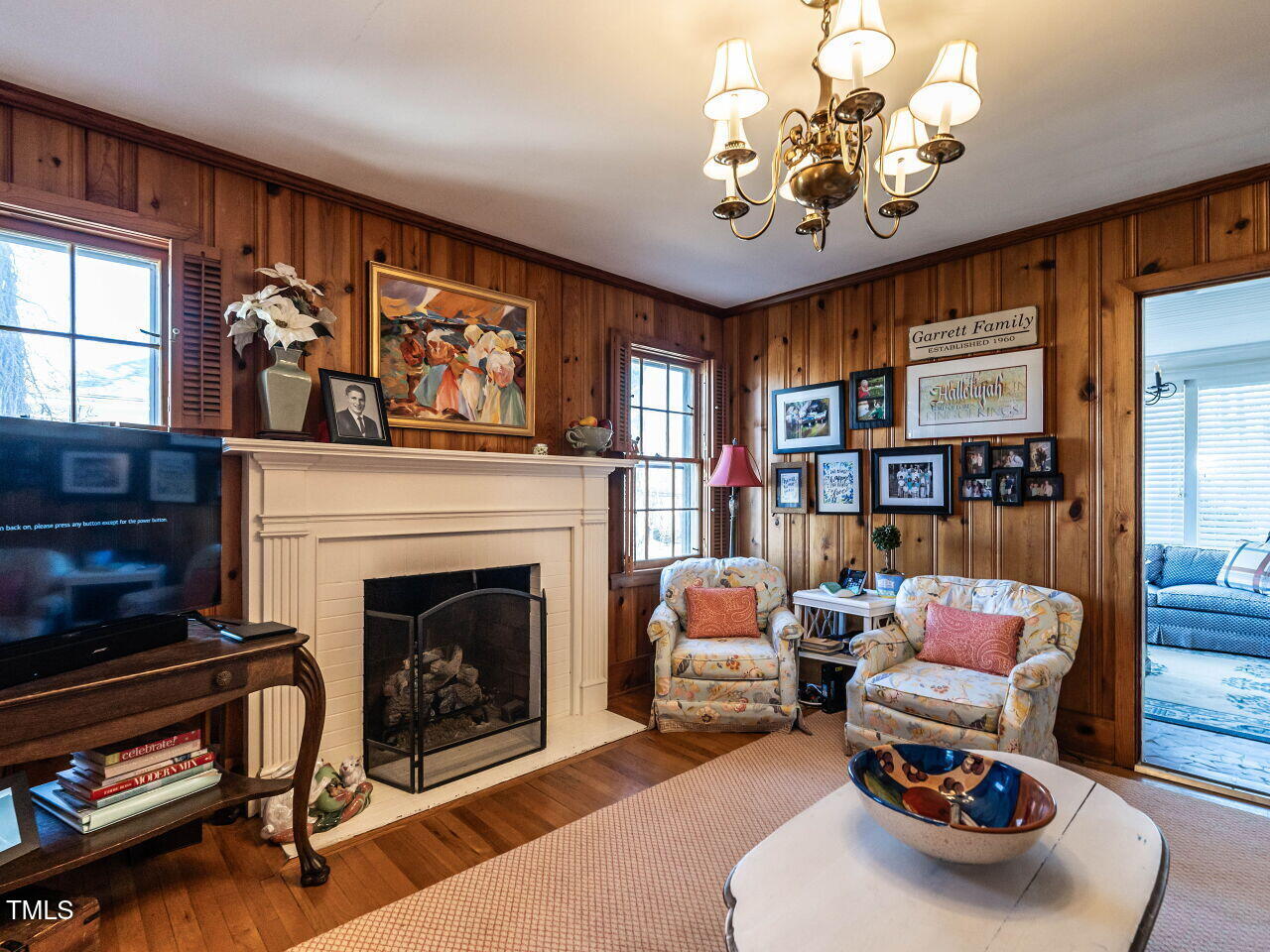 2521 St Marys Street Raleigh, NC 27609 - Photo 15 of 29 a living room with furniture and a fireplace