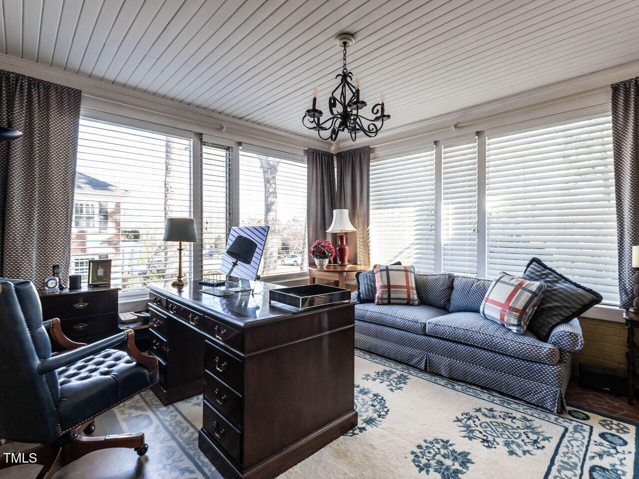 2521 St Marys Street Raleigh, NC 27609 - Photo 16 of 29 a living room with furniture and a large window