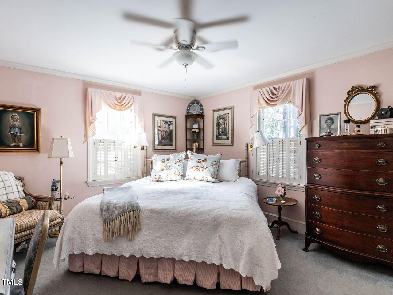 2521 St Marys Street Raleigh, NC 27609 - Photo 21 of 29 a bedroom with a bed and wooden floor