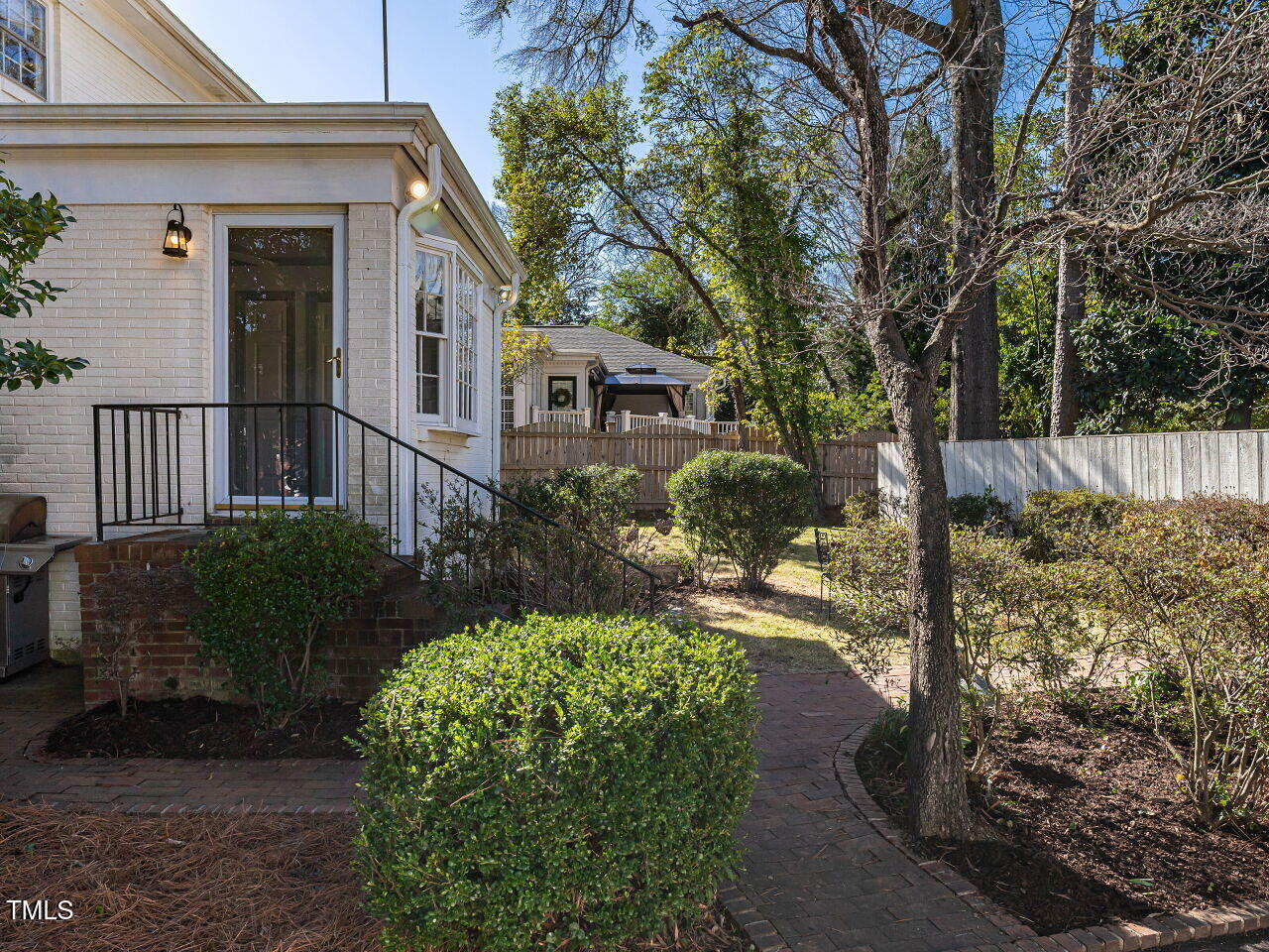 2521 St Marys Street Raleigh, NC 27609 - Photo 24 of 29 a front view of a house with garden