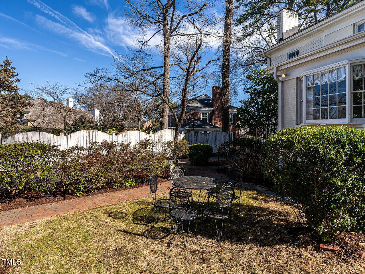 2521 St Marys Street Raleigh, NC 27609 - Photo 26 of 29 a backyard of a house with yard and outdoor seating