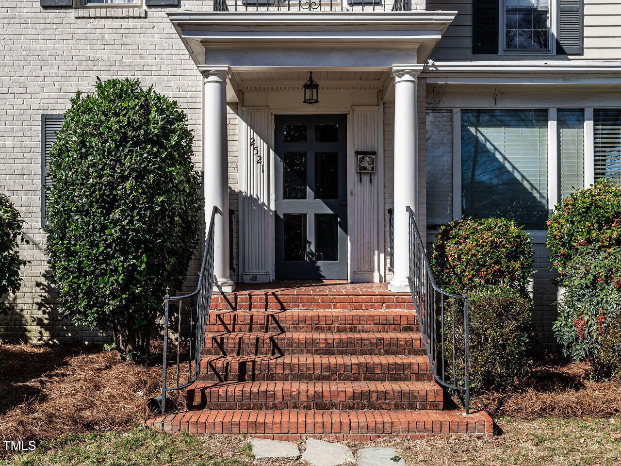 2521 St Marys Street Raleigh, NC 27609 - Photo 3 of 29 a front view of a house with potted plants