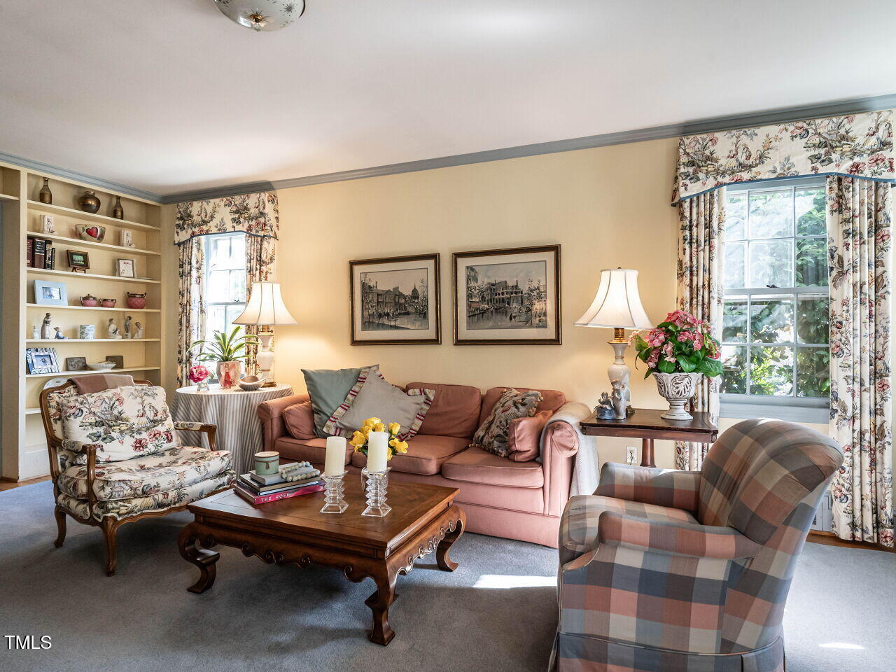 2521 St Marys Street Raleigh, NC 27609 - Photo 7 of 29 a living room with furniture couches and a potted plant on the table