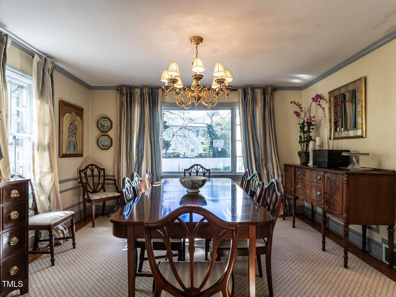 2521 St Marys Street Raleigh, NC 27609 - Photo 8 of 29 a view of a dining room with furniture window and outside view
