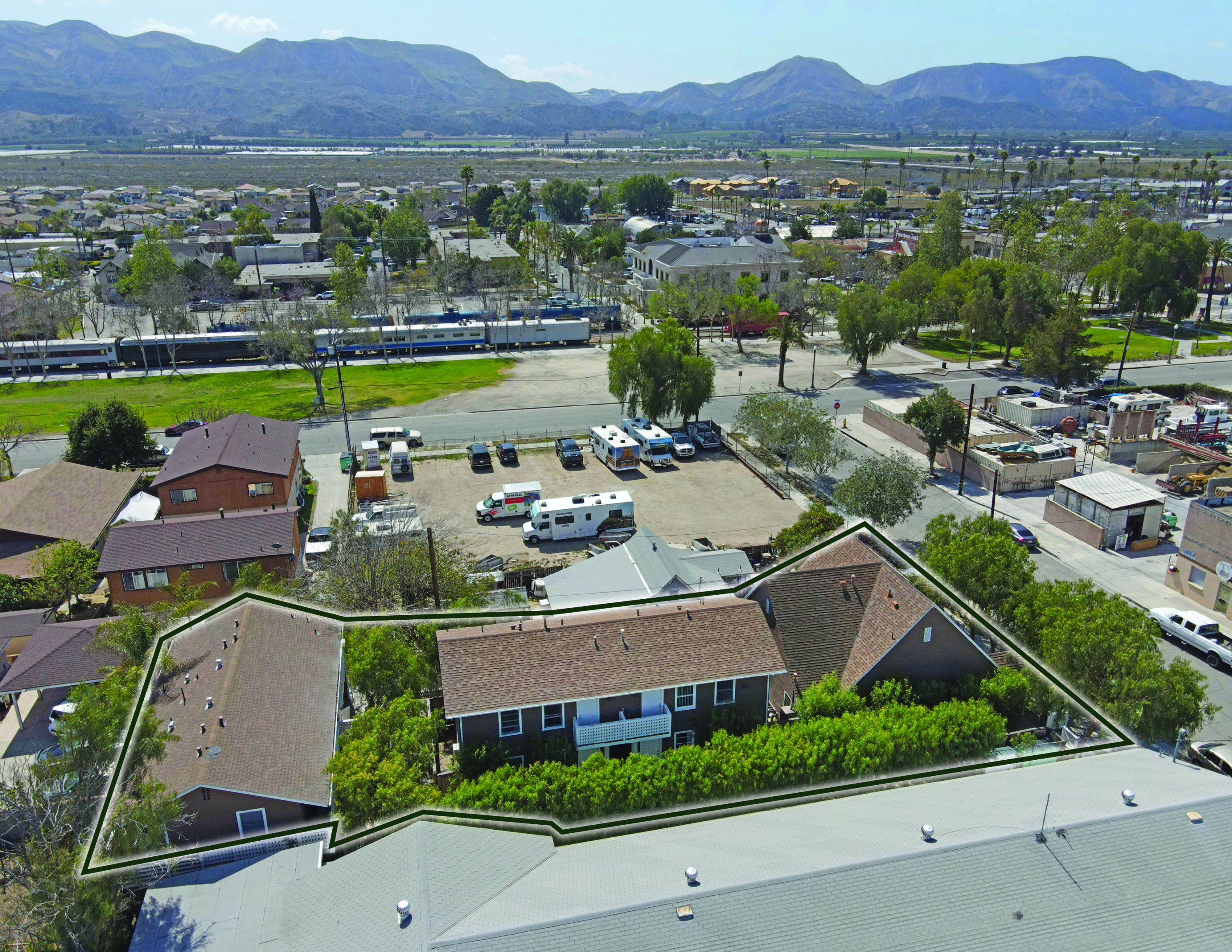 330-332 Fillmore Street Fillmore, CA 93015 - Photo 5 of 8 an aerial view of a house with a lake view