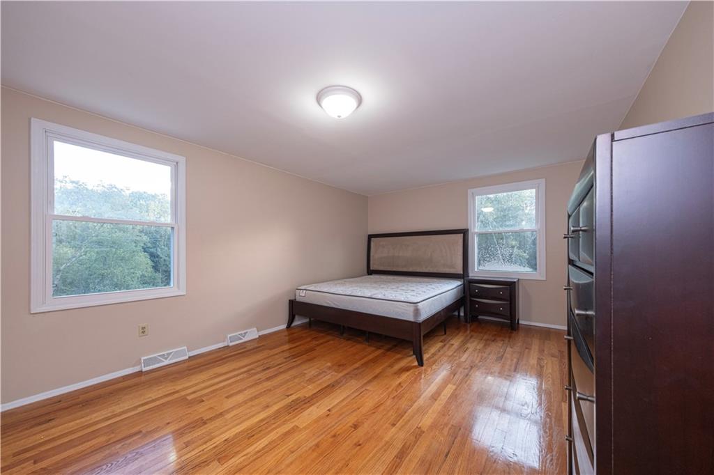 129 Mayberry Drive Monroeville, PA 15146 - Photo 22 of 40 a bedroom with furniture and a window
