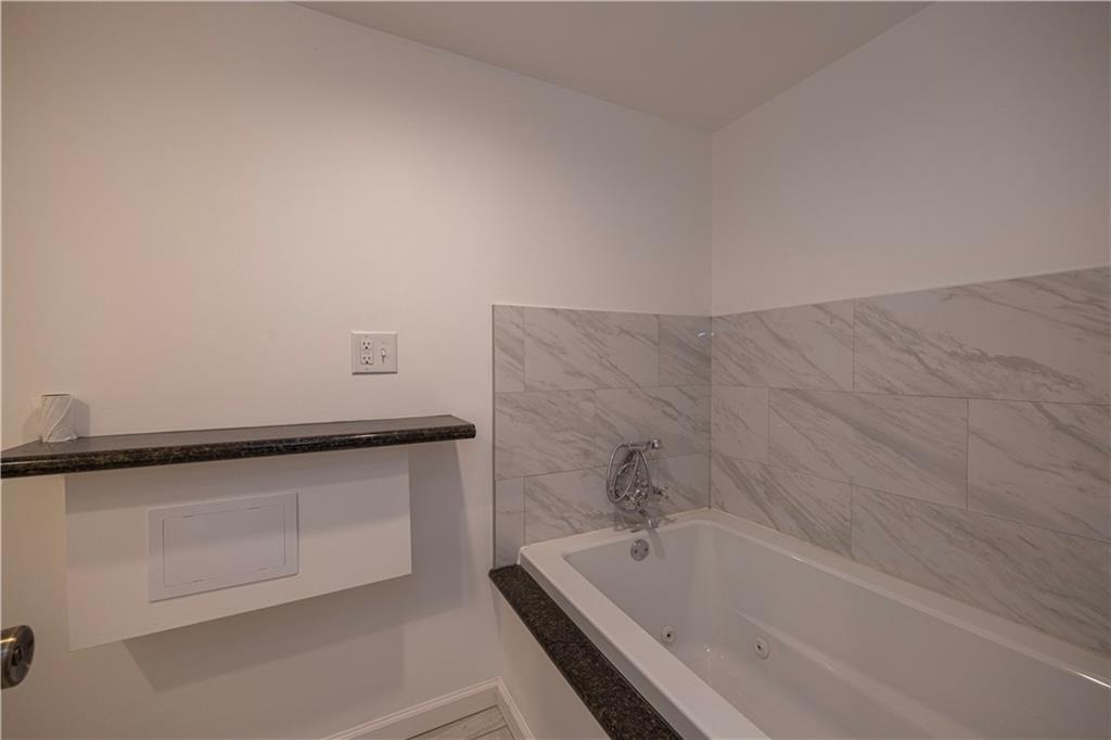 129 Mayberry Drive Monroeville, PA 15146 - Photo 31 of 40 a bathroom with a bathtub and shower