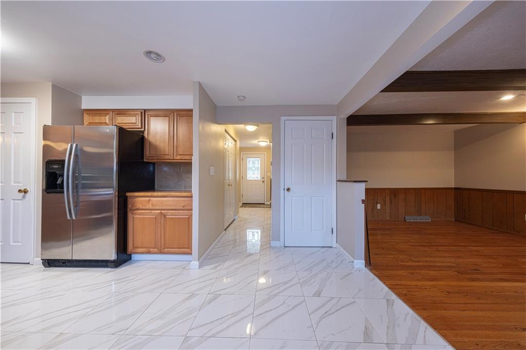 129 Mayberry Drive Monroeville, PA 15146 - Photo 10 of 40 a view of a hallway with wooden floor