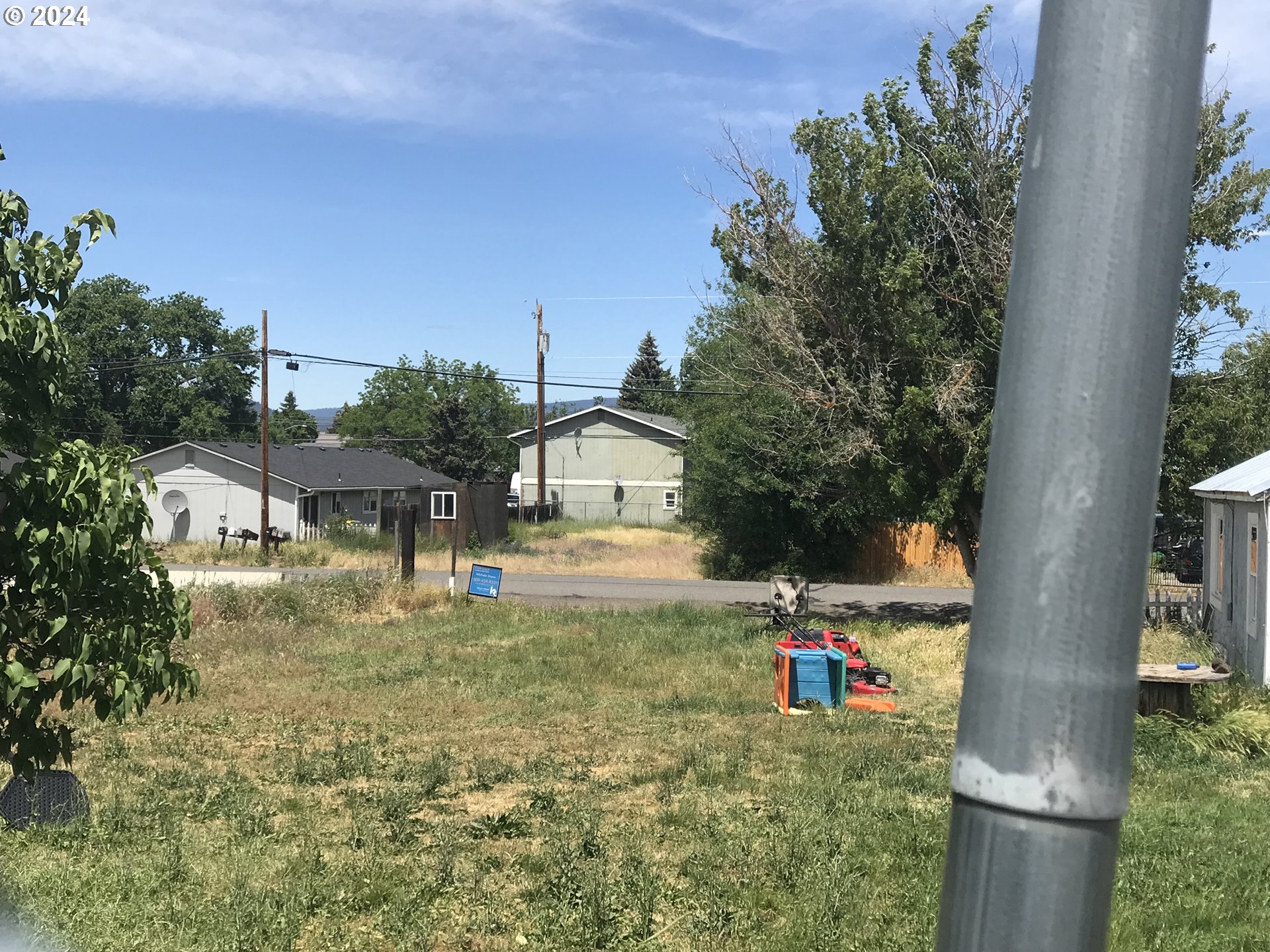 Situs Address Unknow Goldendale, WA 98620 - Photo 2 of 6 a front view of a house with a yard