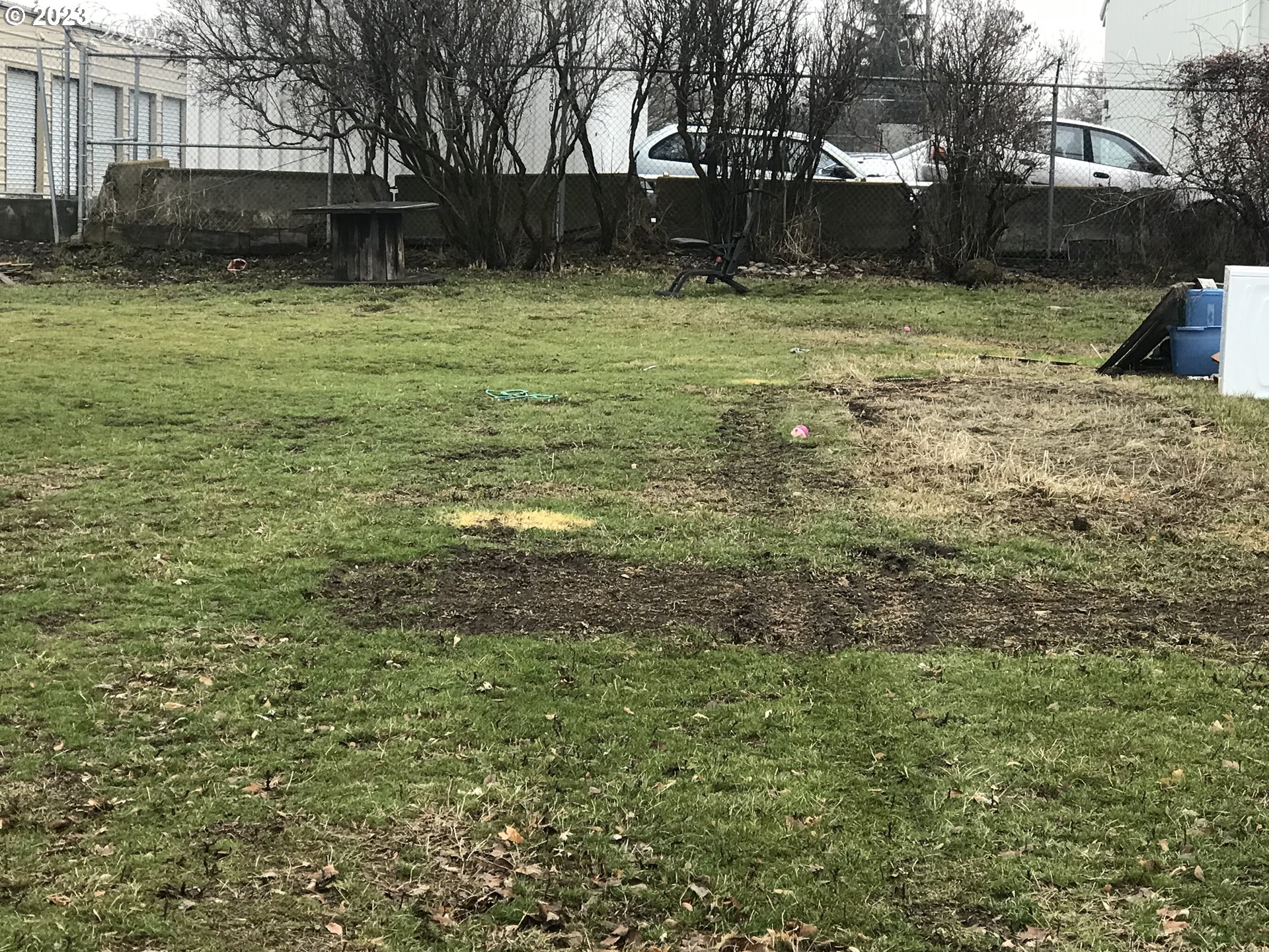 Situs Address Unknow Goldendale, WA 98620 - Photo 3 of 6 a view of a backyard with large trees