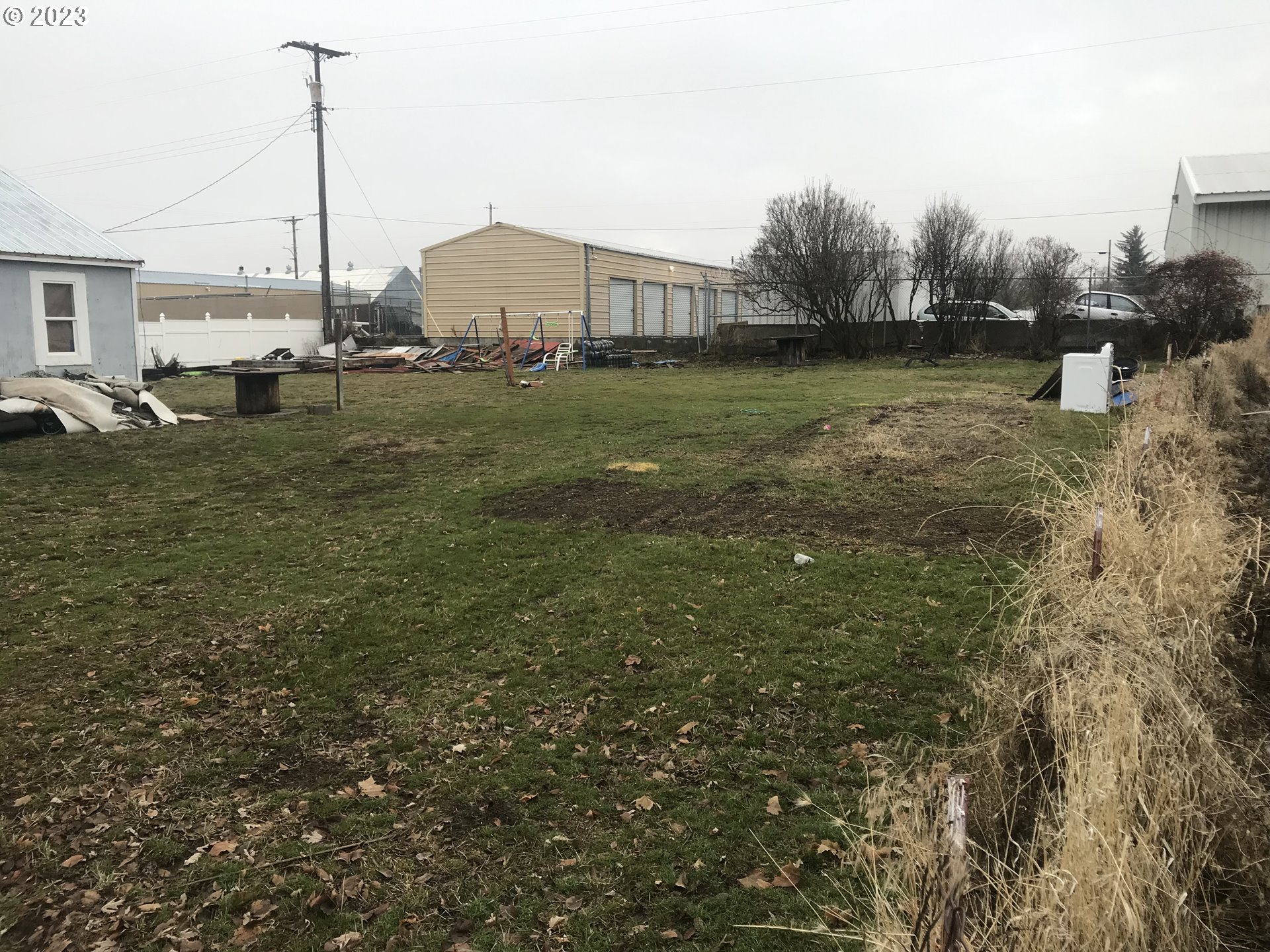 Situs Address Unknow Goldendale, WA 98620 - Photo 4 of 6 a view of a yard with an house