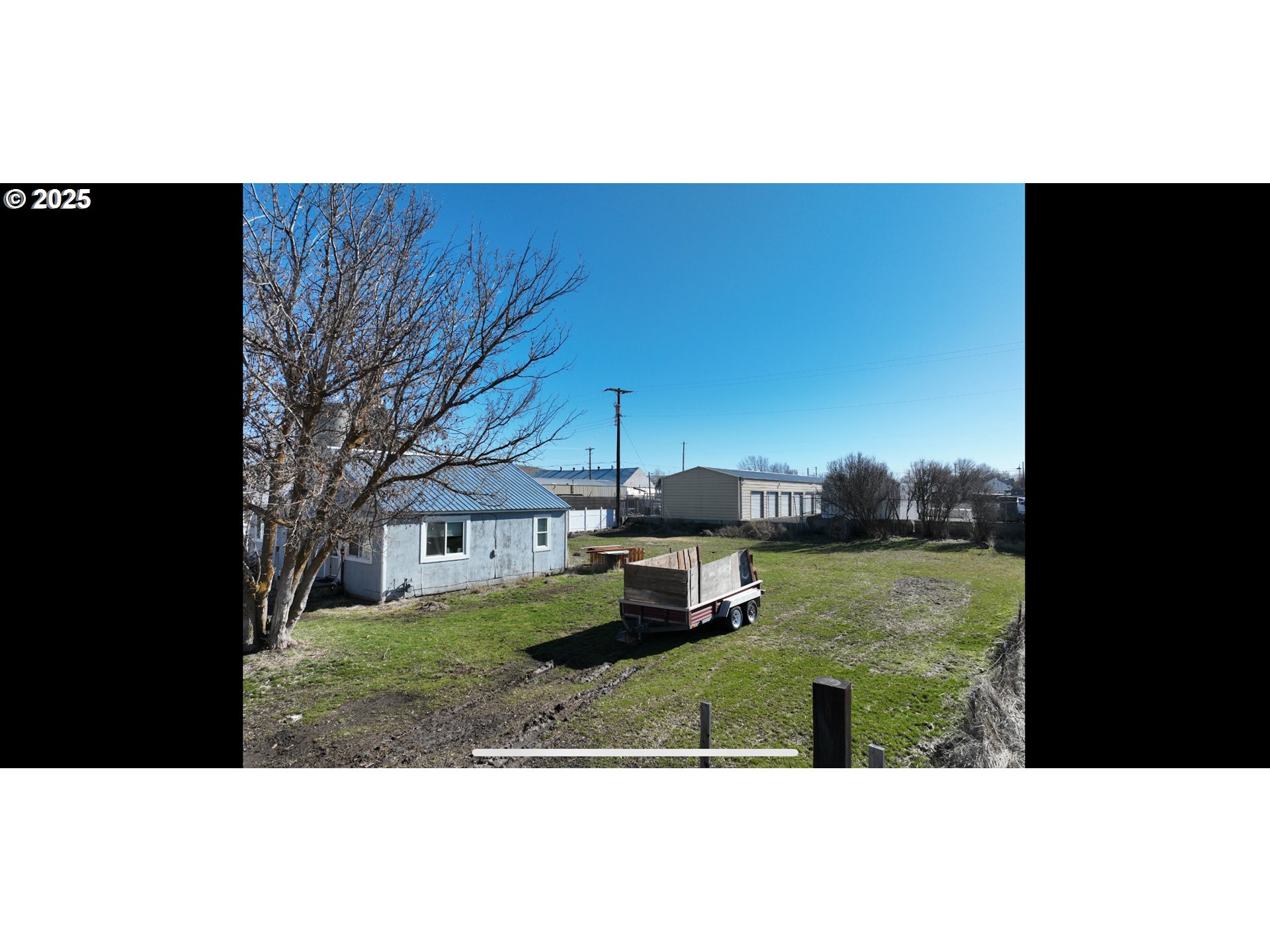 Situs Address Unknow Goldendale, WA 98620 - Photo 6 of 6 a view of a house with a yard