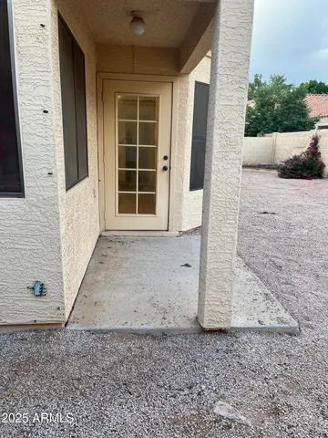 a view of a water fountain and a big yard