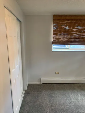 a kitchen with stainless steel appliances granite countertop a stove and a microwave