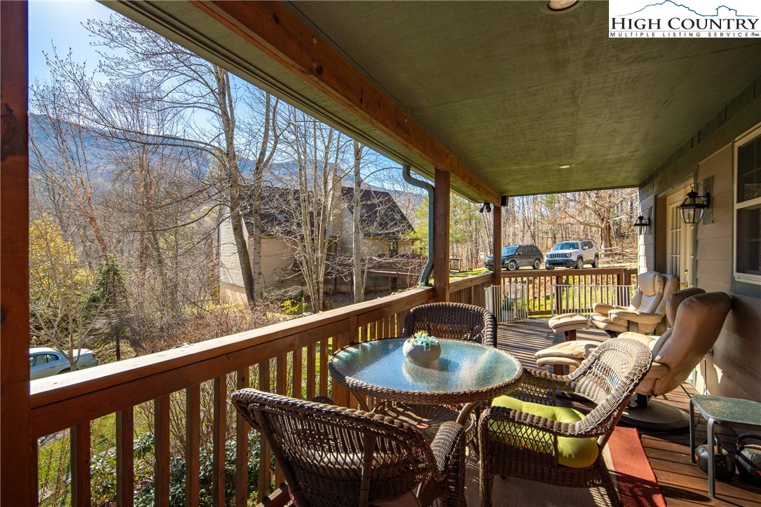 144 Grandfather Farms Road Banner Elk, NC 28604 - Photo 11 of 41 a view of a dining room with furniture window and outside view