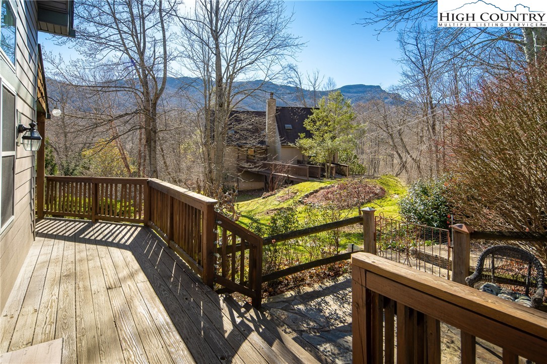 144 Grandfather Farms Road Banner Elk, NC 28604 - Photo 12 of 41 a view of a balcony with two chairs