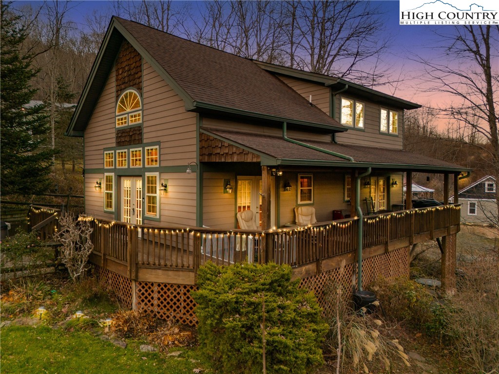 144 Grandfather Farms Road Banner Elk, NC 28604 - Photo 2 of 41 a front view of a house with balcony
