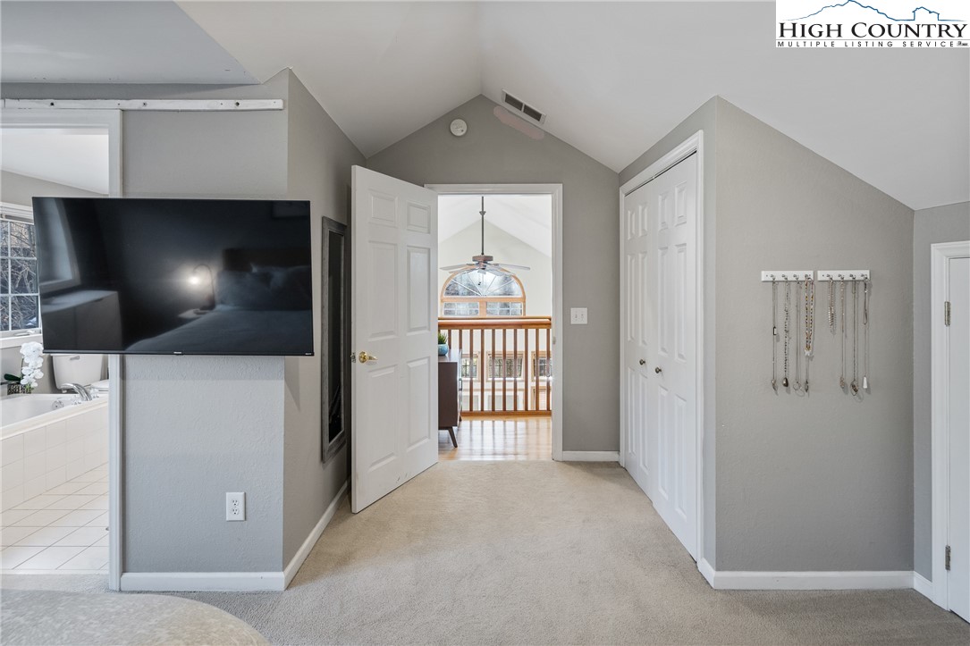 144 Grandfather Farms Road Banner Elk, NC 28604 - Photo 21 of 41 a view of a livingroom with a fireplace and window