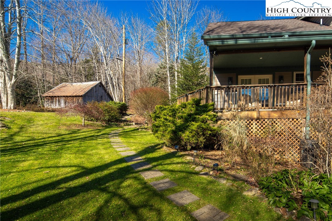 144 Grandfather Farms Road Banner Elk, NC 28604 - Photo 8 of 41 a view of a house with a yard